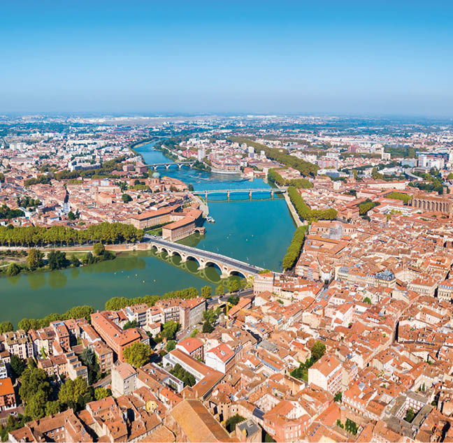 Toulouse and Garonne river aerial panoramic view  Toulouse is the capital of Haute Garonne department and Occitanie region in France 